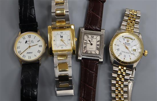 Four assorted gentlemans wrist watches.